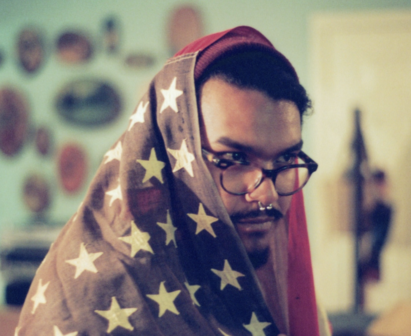 Luna wrapped in American flag. Ashley Hoffman, 2016.