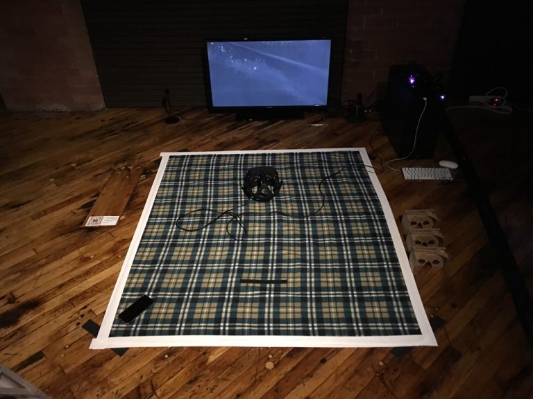 User in VR Experience on picnic blanket 2