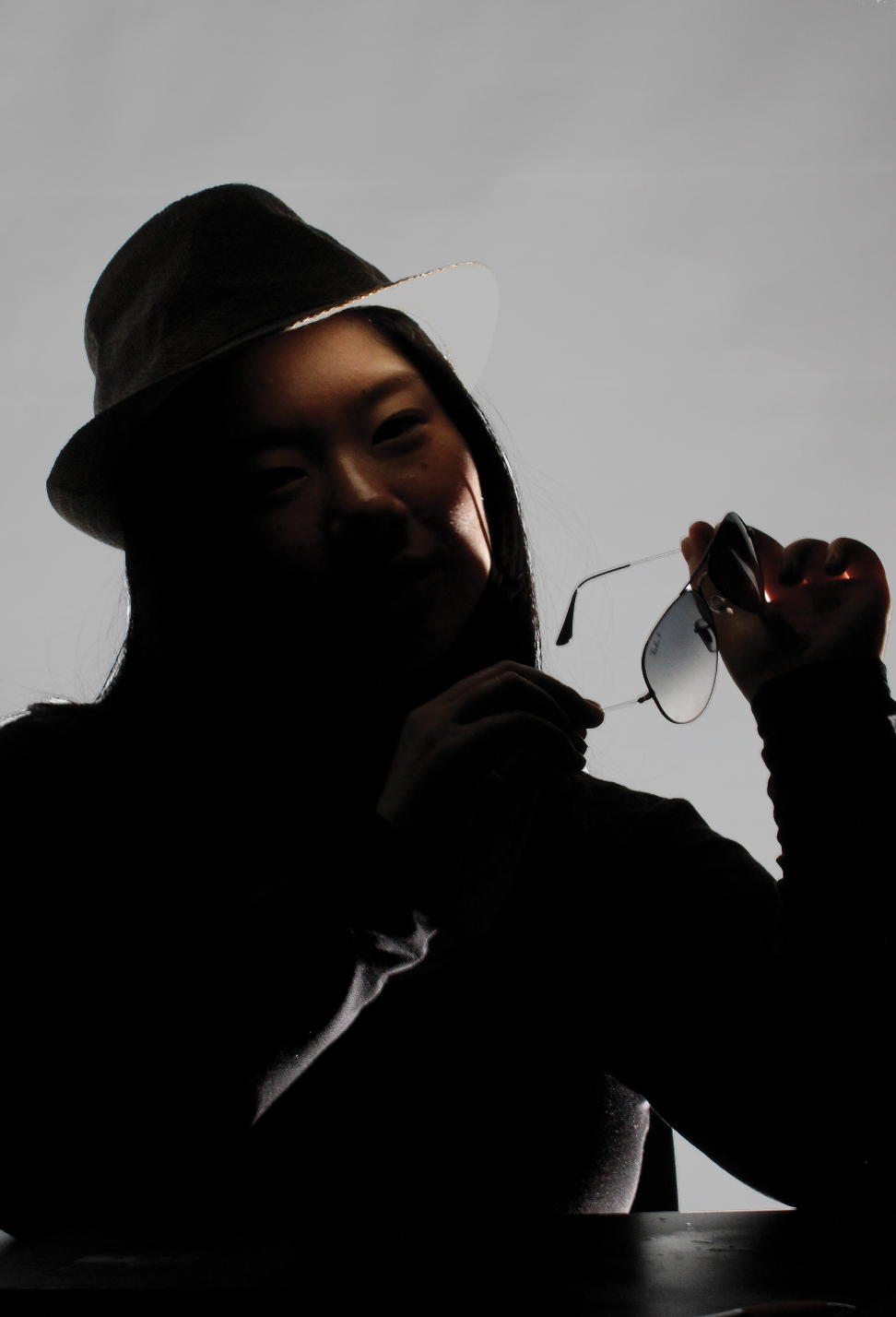 A Face Half-Lit, A Face Still Concealed