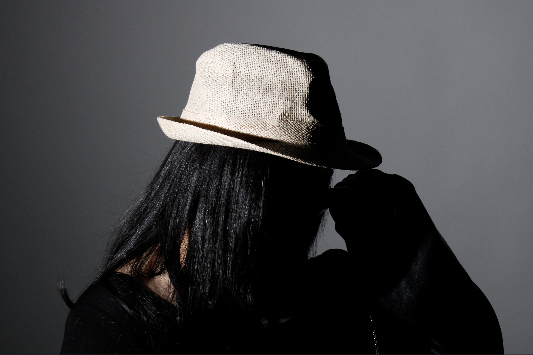 A Face Half-Lit, A Face Still Concealed