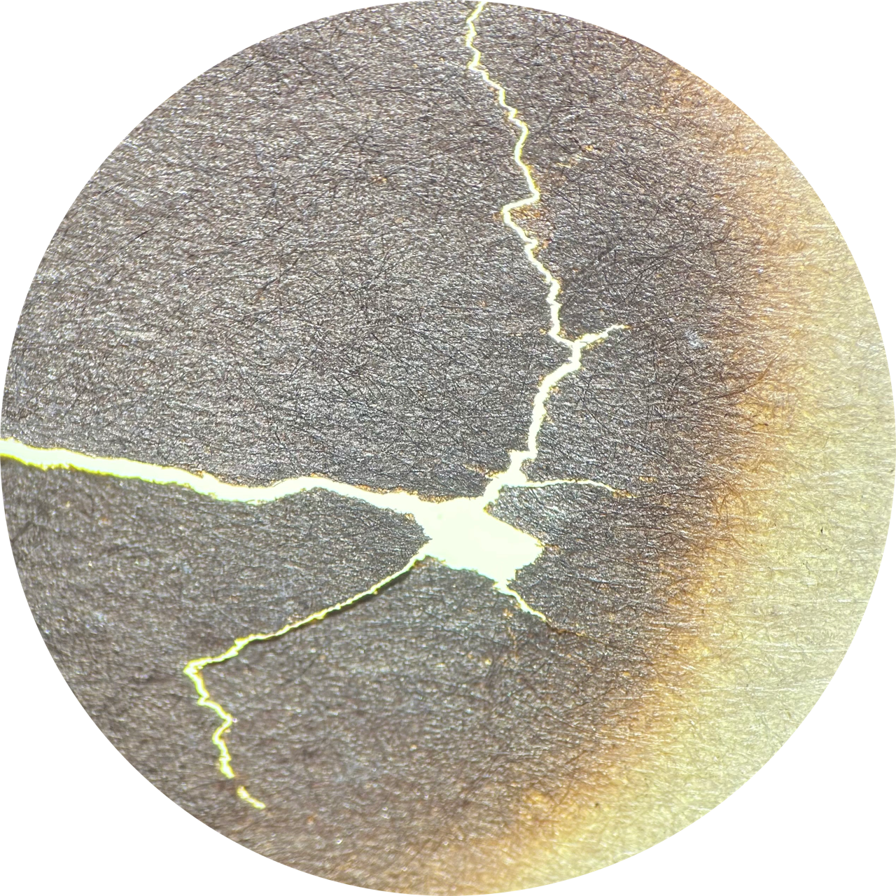 Fumage on Newsprint at 20x Magnification