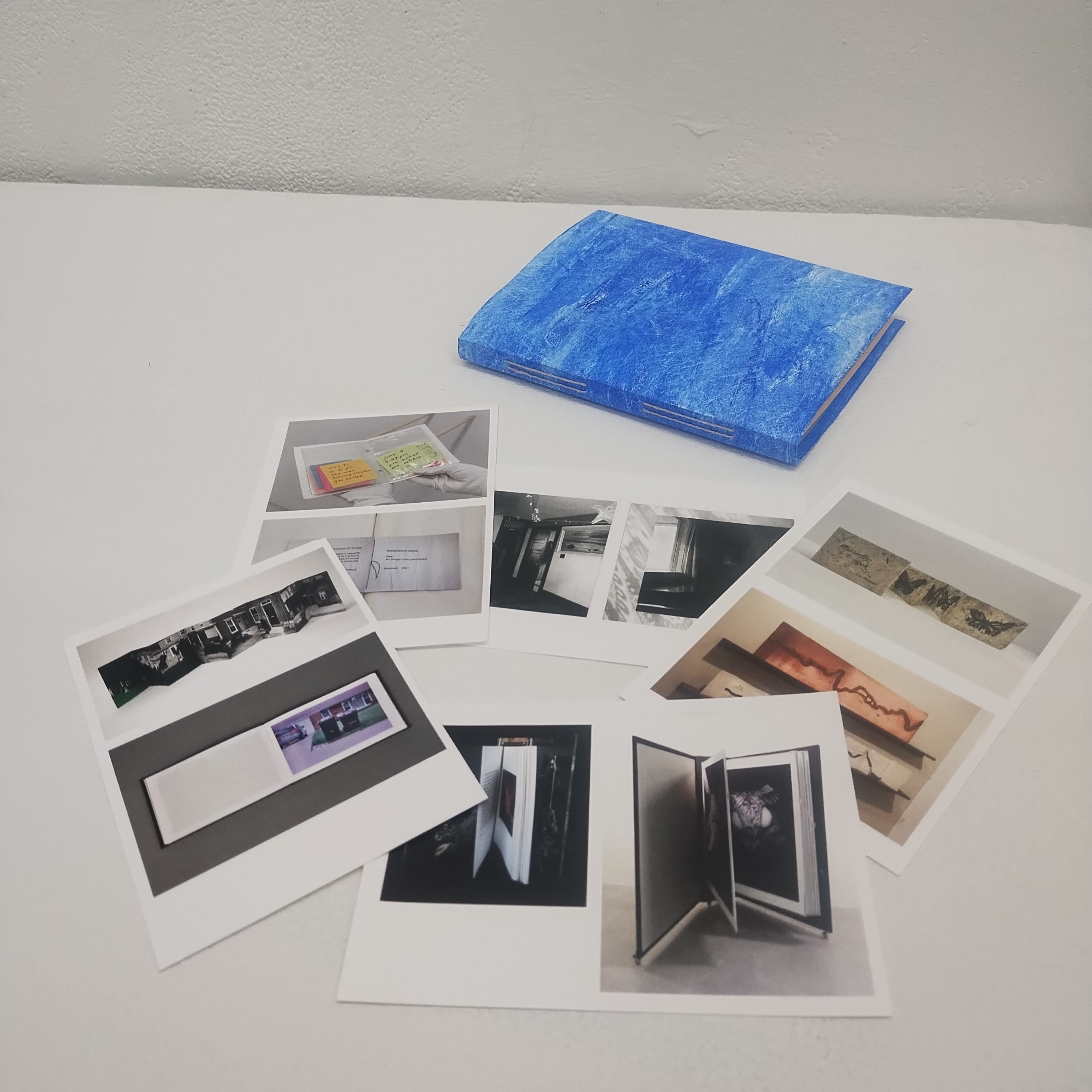 Hand Bound: view of work with colour plate cards