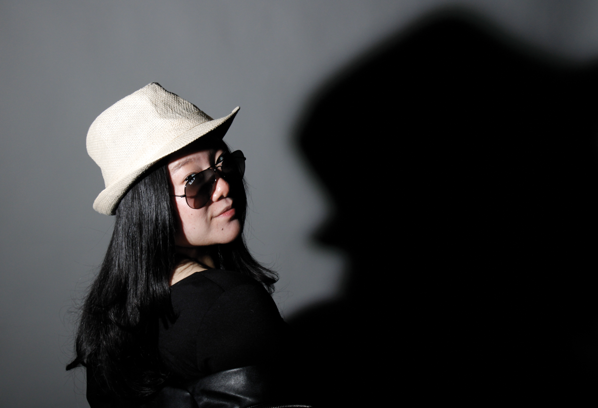 A Face Half-Lit, A Face Still Concealed