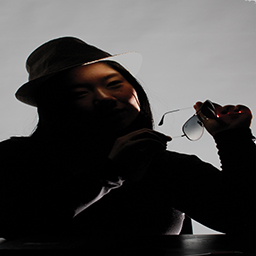 A Face Half-Lit, A Face Still Concealed